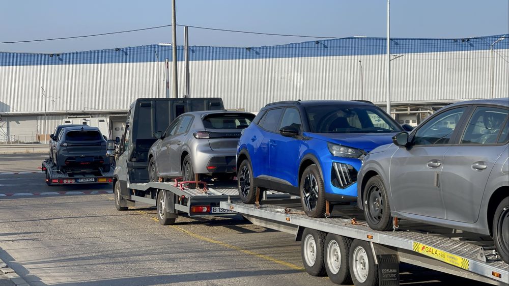 Transport Masini pe platforma/Romania/Austria/Germania/Olanda/Belgia