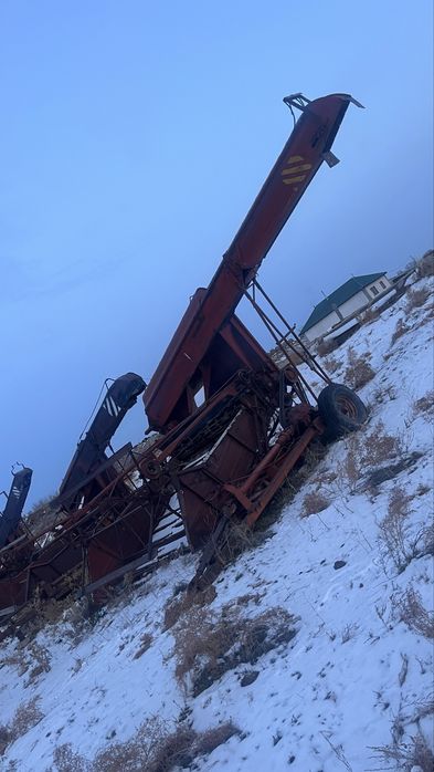 Прицепной стлосный комбайн