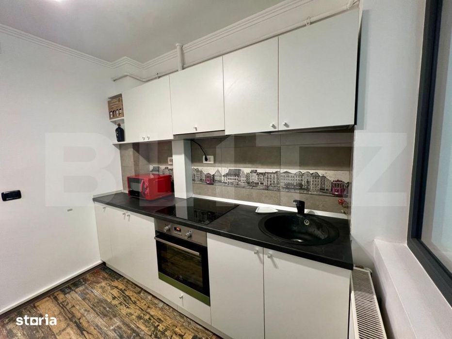 Apartament cu 2 camere, parter, centrala si AC, zona centrala