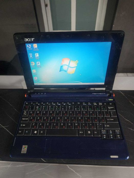 Acer Aspire one ZG5 бюджетный нетбук  windows 7