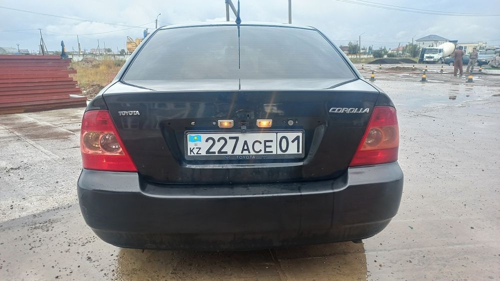 Тойота каролла 2004 г