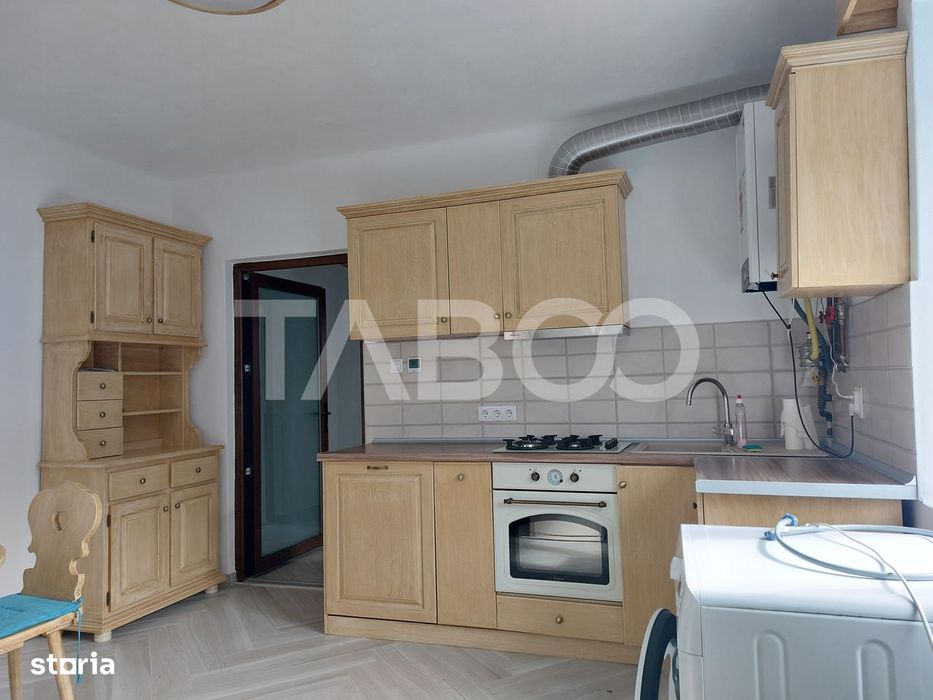 Casa 58 mp cu gradina 300 mp pet friendly central Cisnadioara