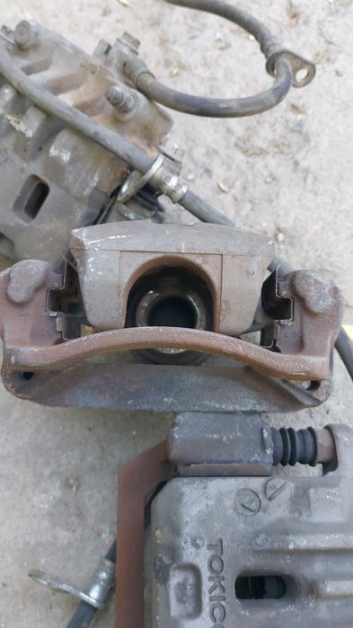 Суппорта задние на Subaru Outback  BP