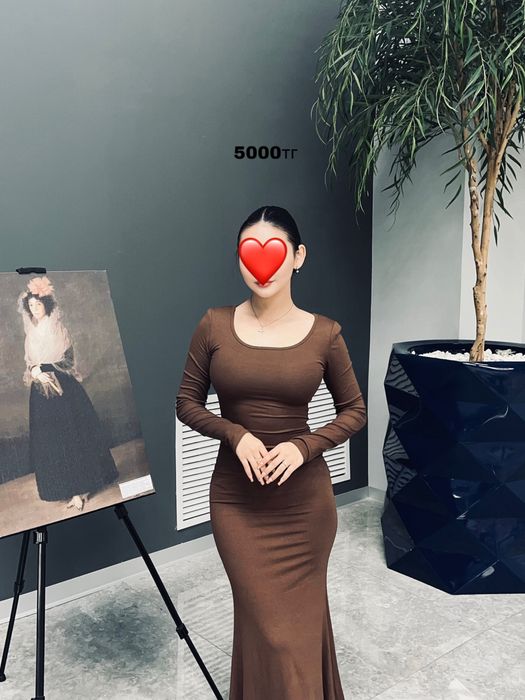 Женские одежды .