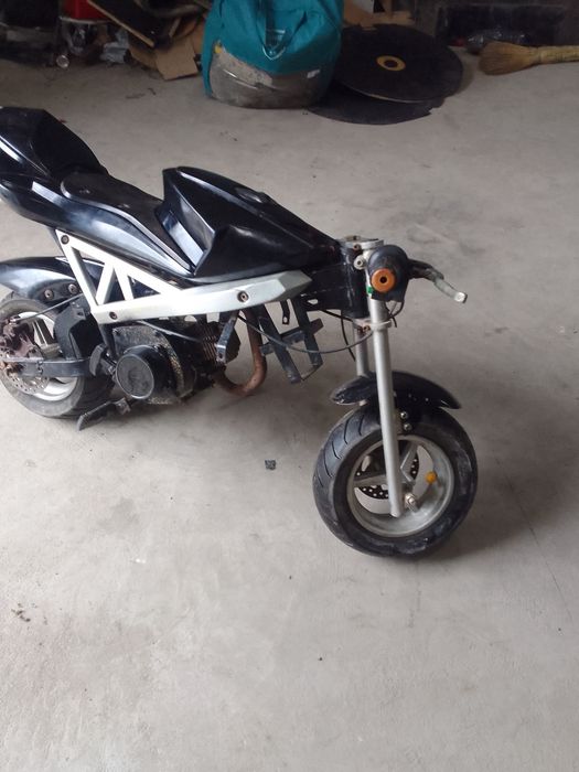 Mini bayk sotiladi benzinda yuradi