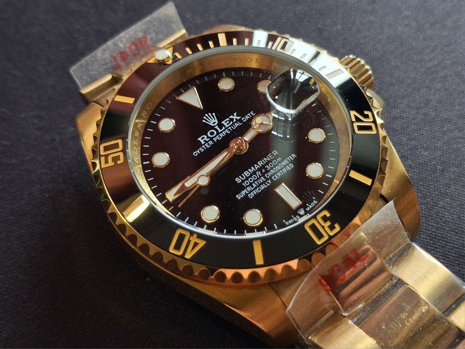 Rolex  Submariner, Day-Date Gold