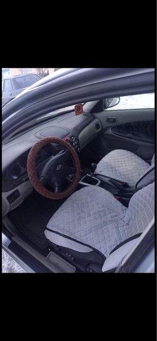 Nissan almera n16 2002год