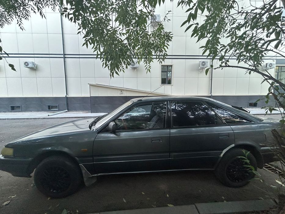 Машина Mazda 626