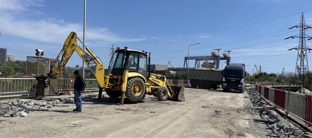 Buldoexcavator cu picon, Demolari, Evacuari moloz