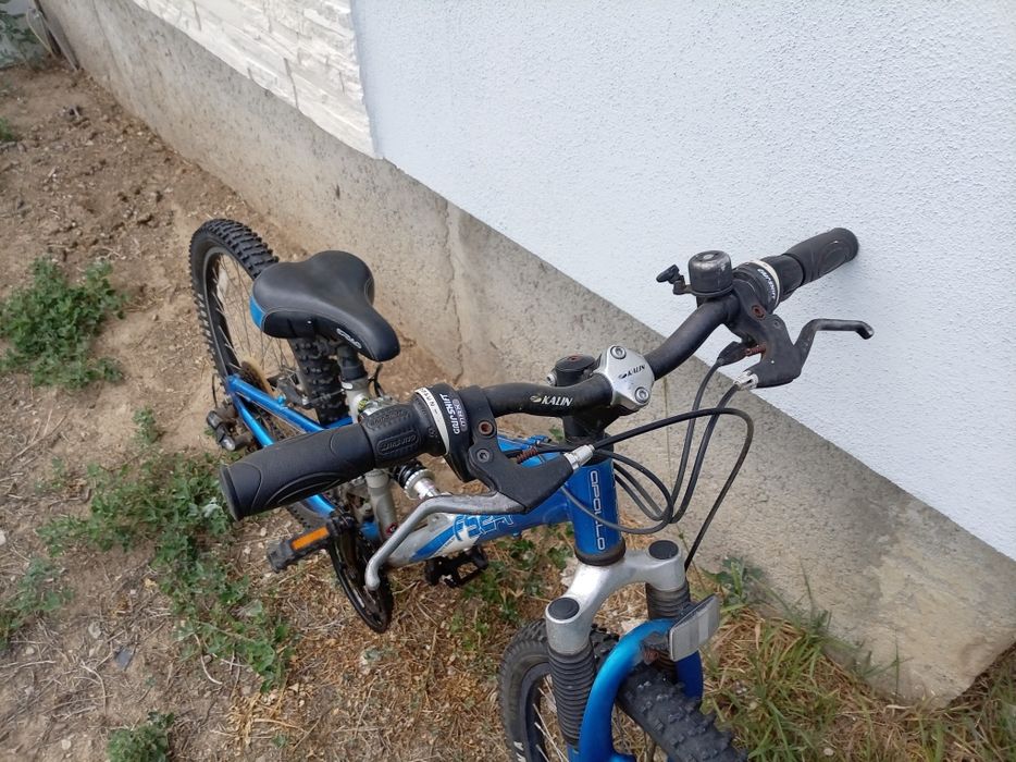 Vand ieftin bicicleta pentru copii roti de 24 , frana pe disc.