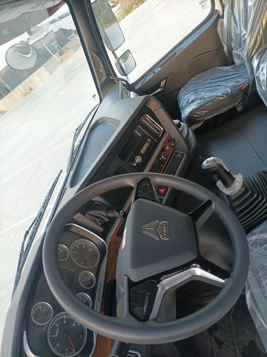 Самосвал HOWO-T7S 8x4 - 32 т / 26 куб.м Sunhunk