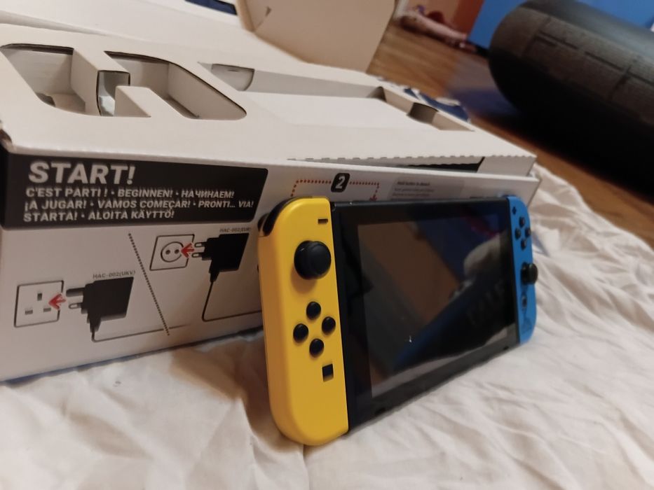 Nintendo Switch-în stare  noua+joc pokémon shield