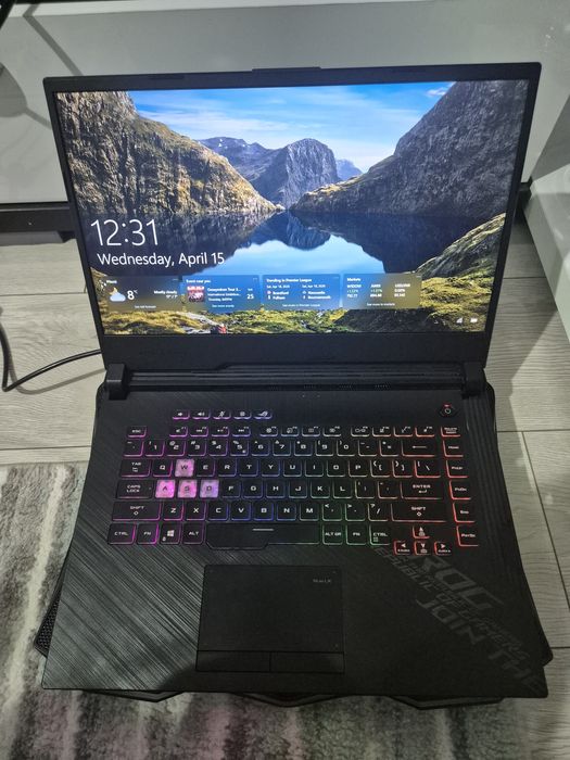 Laptop Gaming ASUS ROG Strix G15 G512LV cu RTX 2060 alaturi de cooler (castile si mouse-ul se pot da impreuna)