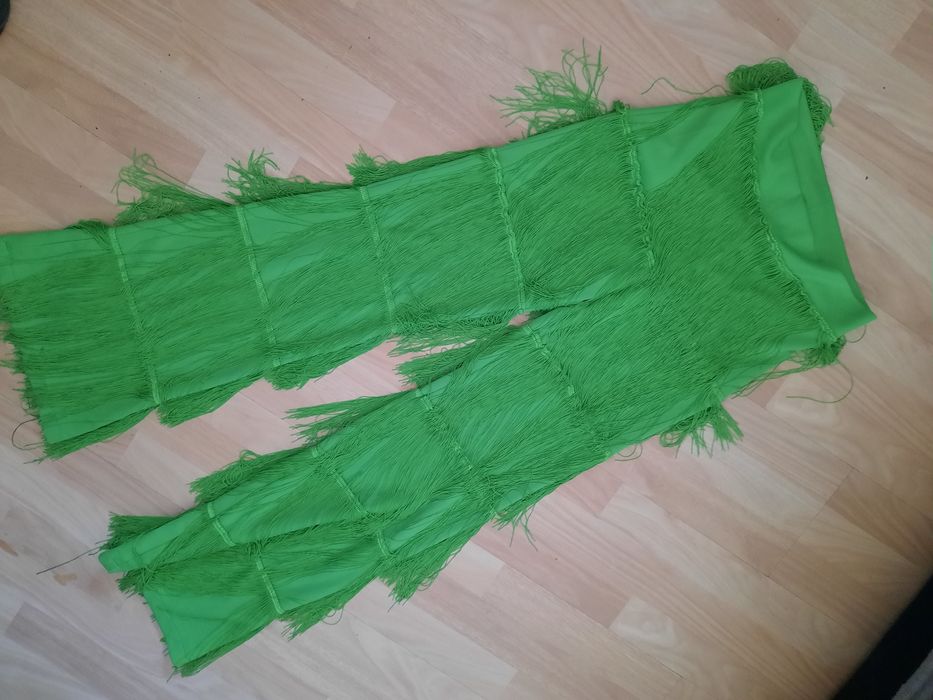 Pantaloni eleganti cu franjuri