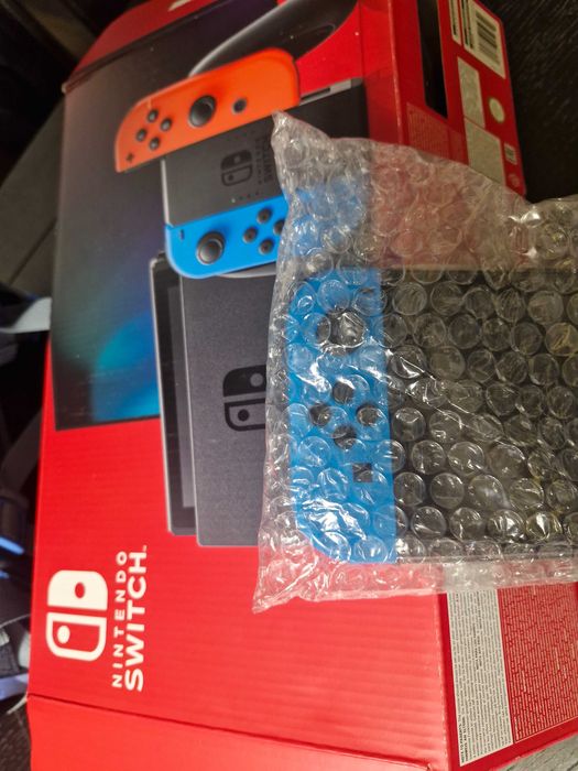 Nintendo Switch + pachet complet accesorii – stare foarte bună
