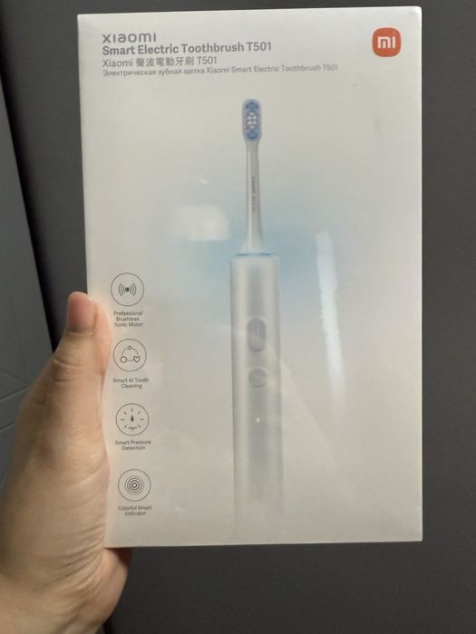 Новая элекричекая зубная щетка