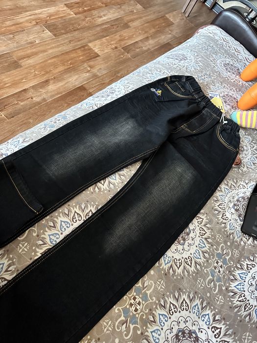 Джинсы (новые)