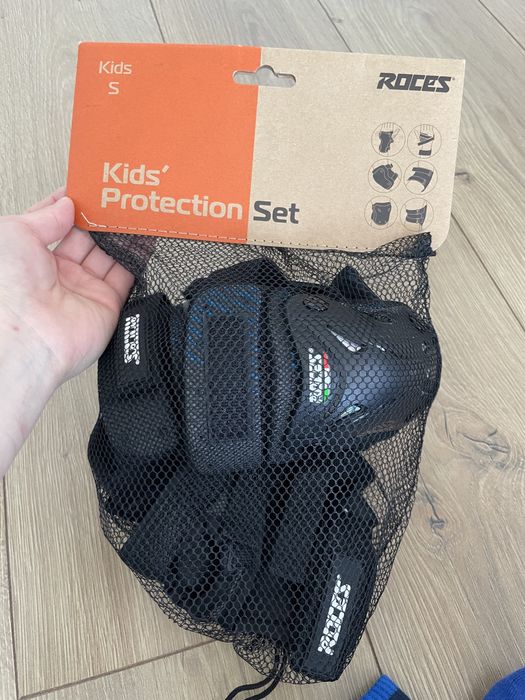 Роликовые коньки