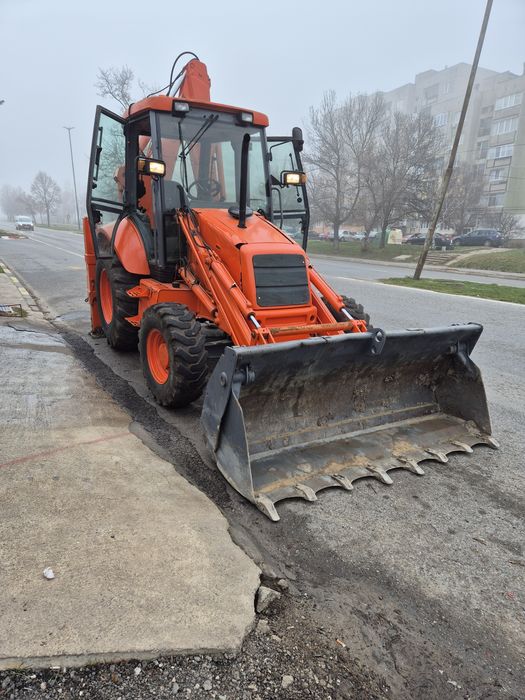 Услуги с комбиниран багер за Перник и  София
