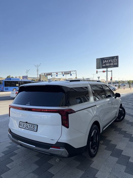 KIA Carnival гибрид 2026