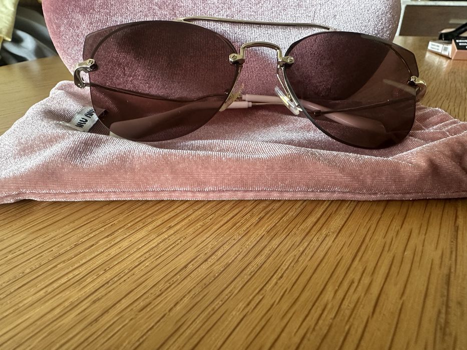 Слънчеви очилаMiu Miu