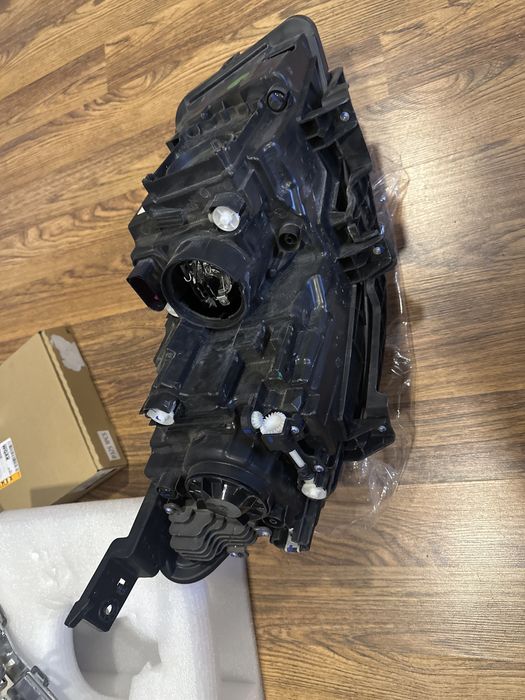 Фара левая Geely Emgrand