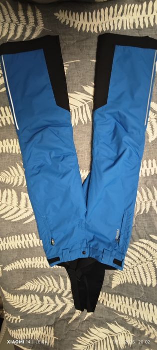 Новые зимние штаны на мальчика фирмы Reima tec размер 146
