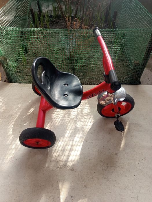 Трёхколёсный велосипед .