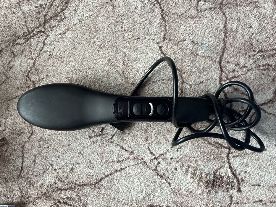 Електрическа четка за изправяне на коса.