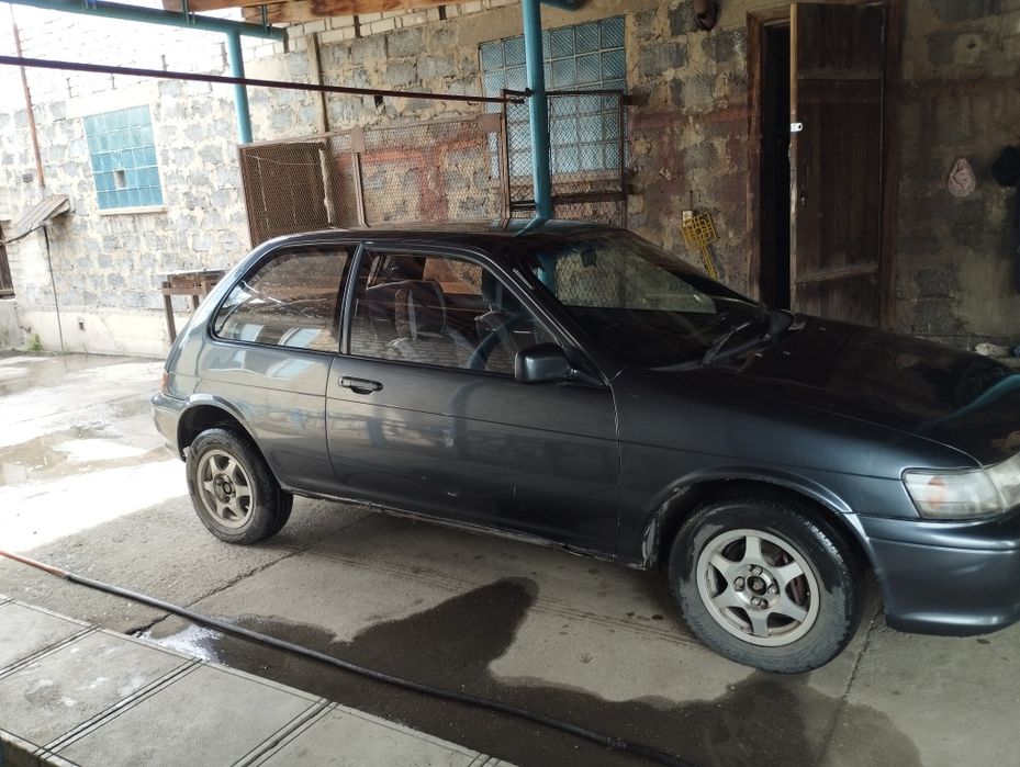 Машину Тойота Королла