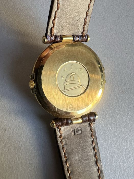 18 k aur Omega Constellation Day-Date,quartz ref.196.1070 cal.1444