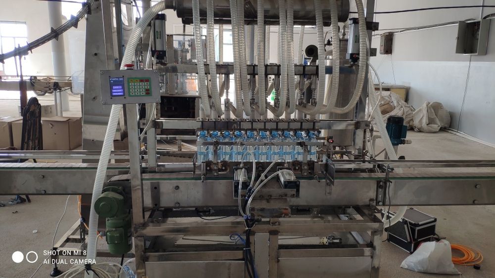 Сув куйиш линияси. дозатор, розлив