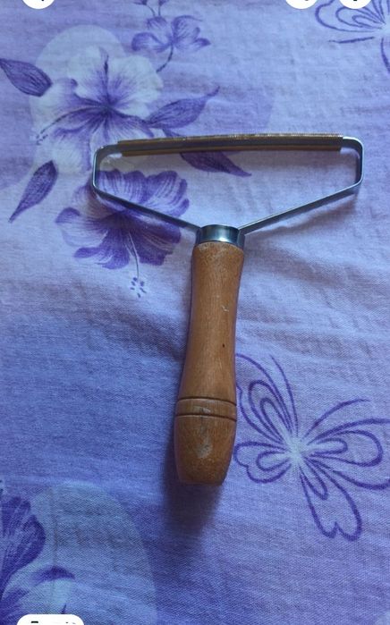 Dispozitiv pentru înlăturat scame