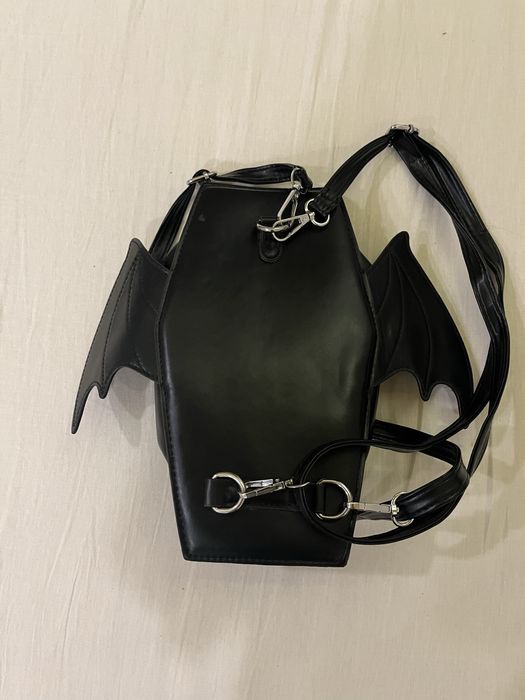 малка чанта с крила