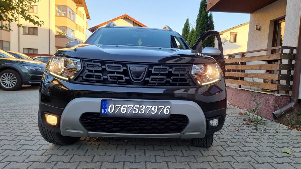 Activare functie Cornering pentru proiectoare - Dacia Duster 2