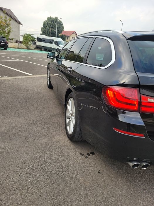 BMW Seria 5 2011 — imagine 2