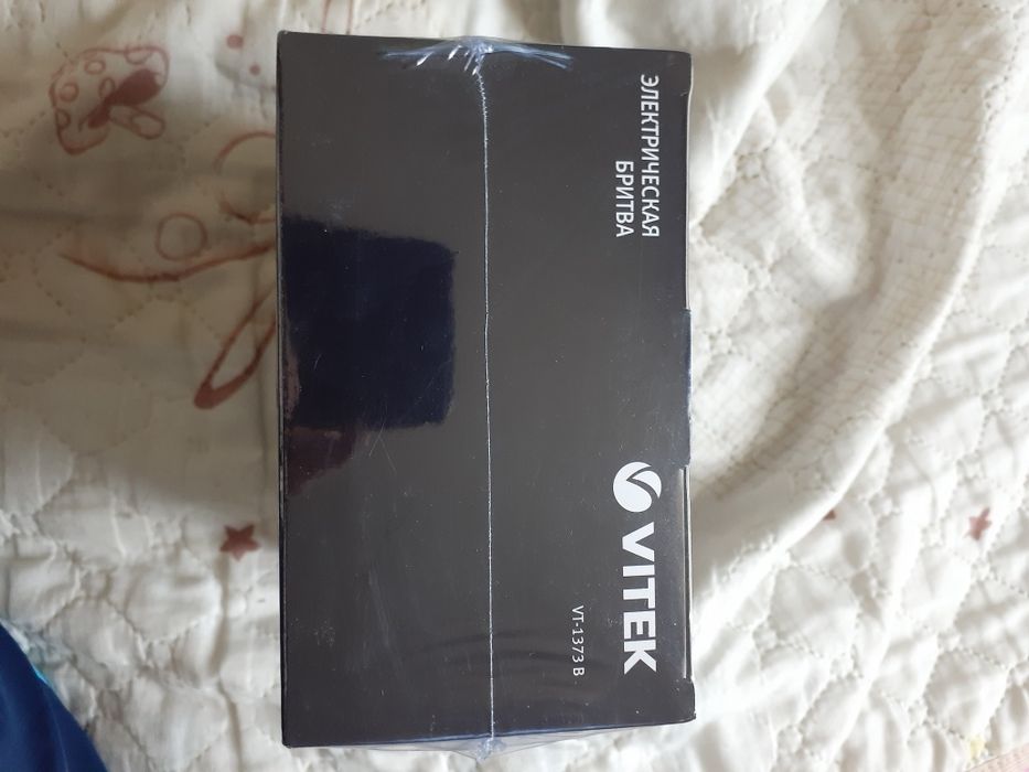 Электрическая бритва "Vitek".