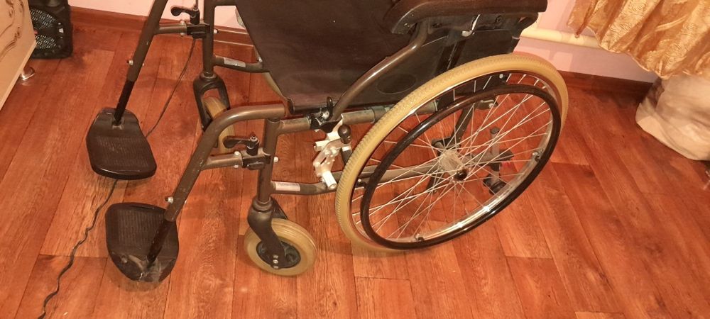 Инвалидный коляска