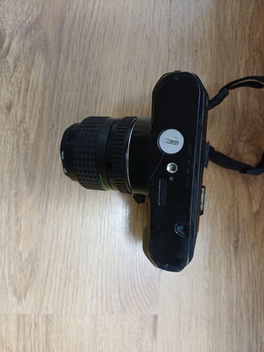 Aparat foto Pentax P30 functional. Buza obiectivului putin deformata