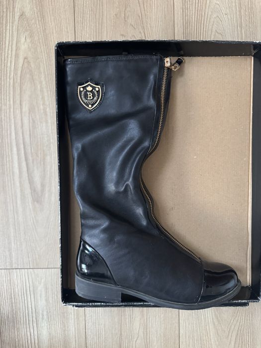 Нови елегантни ботуши