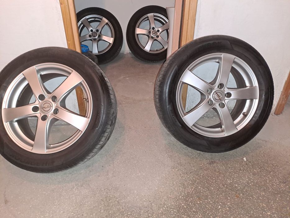 ASTRA J ALIAJ DEZENT cu anvelope de vară HANKOOK  DOT luna 1221 R16