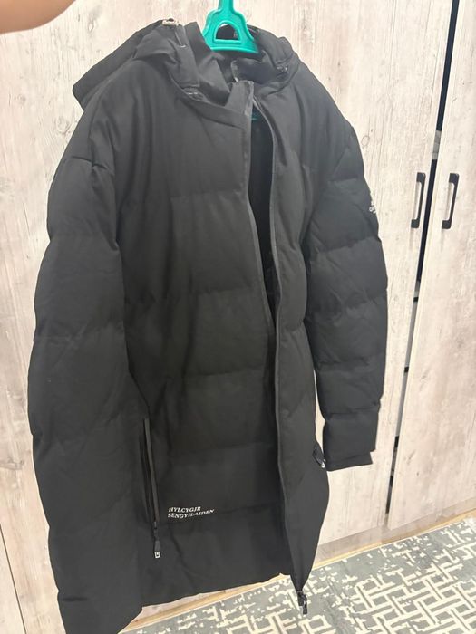 Продам пуховик новый
