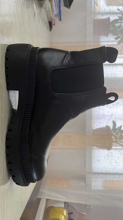 Модные кожаные сапоги