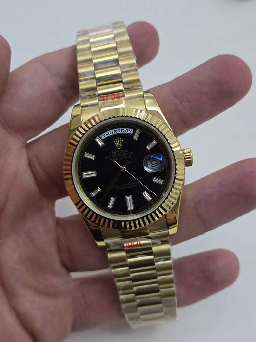 Rolex Day-Date black dial yellow gold 40mm