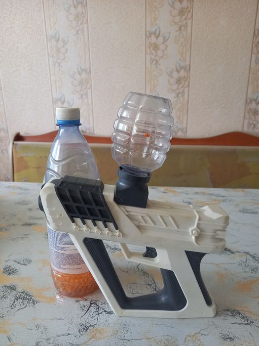 Игрушка пистолет