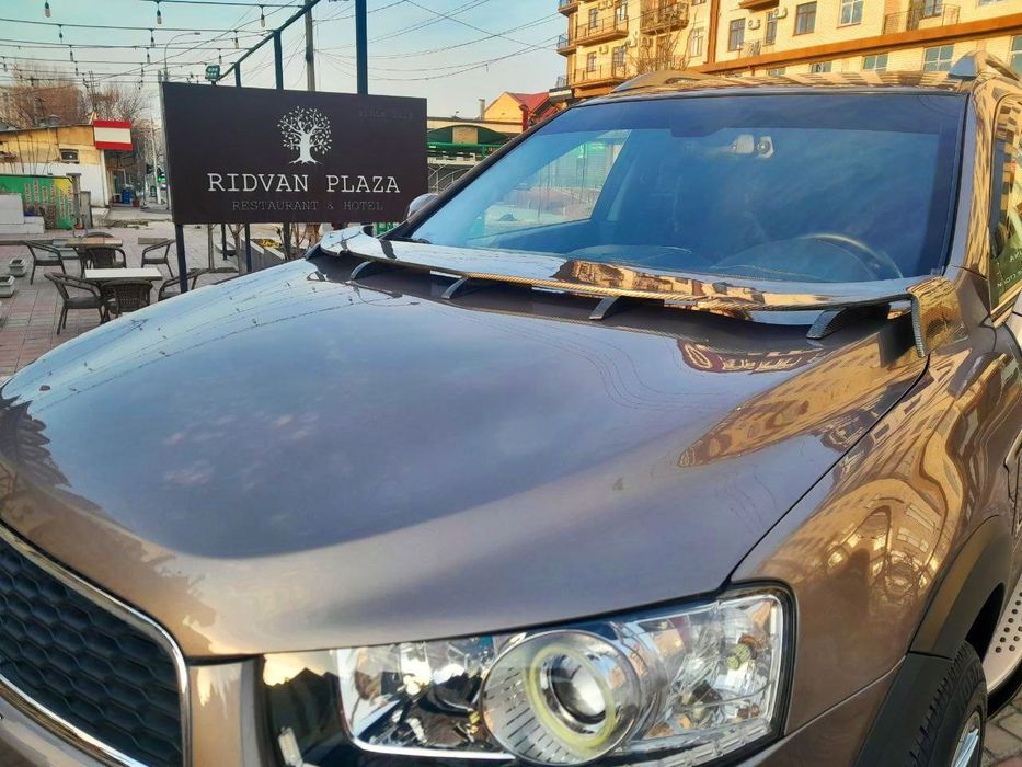 Продам обвес  спойлера на каптиву