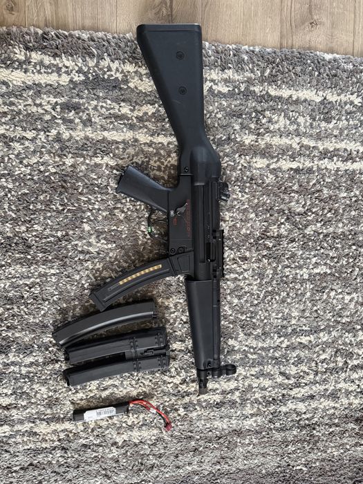 arma airsoft MP5 g&g blowback
