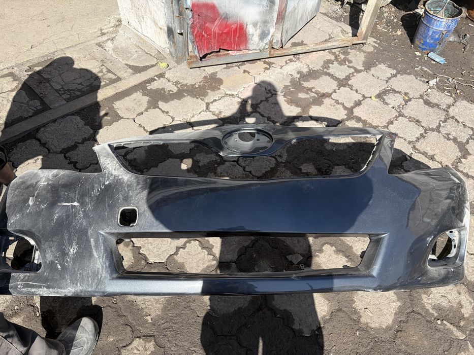 Передний бампер Tayota camry