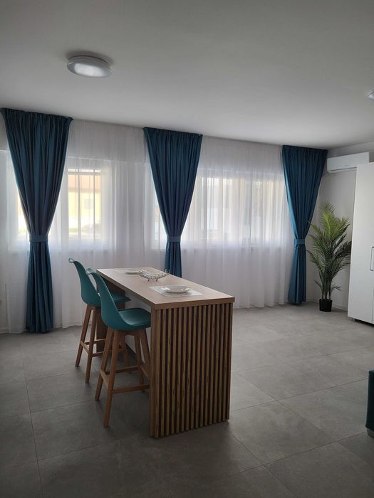 Garsoniera moderna de inchiriat Calea Bucuresti 400 euro 42 mp mobilata si utilata complet AC centrala pe gaz loc de parcare constructie 2024