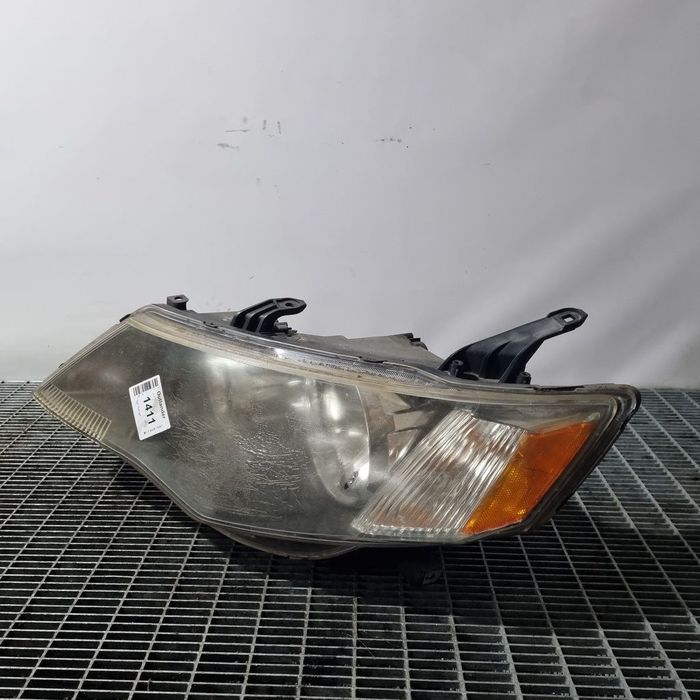 Far Stanga Mitsubishi Outlander 2009 - 2012 SUV 4 Usi (1411) Cu lupă